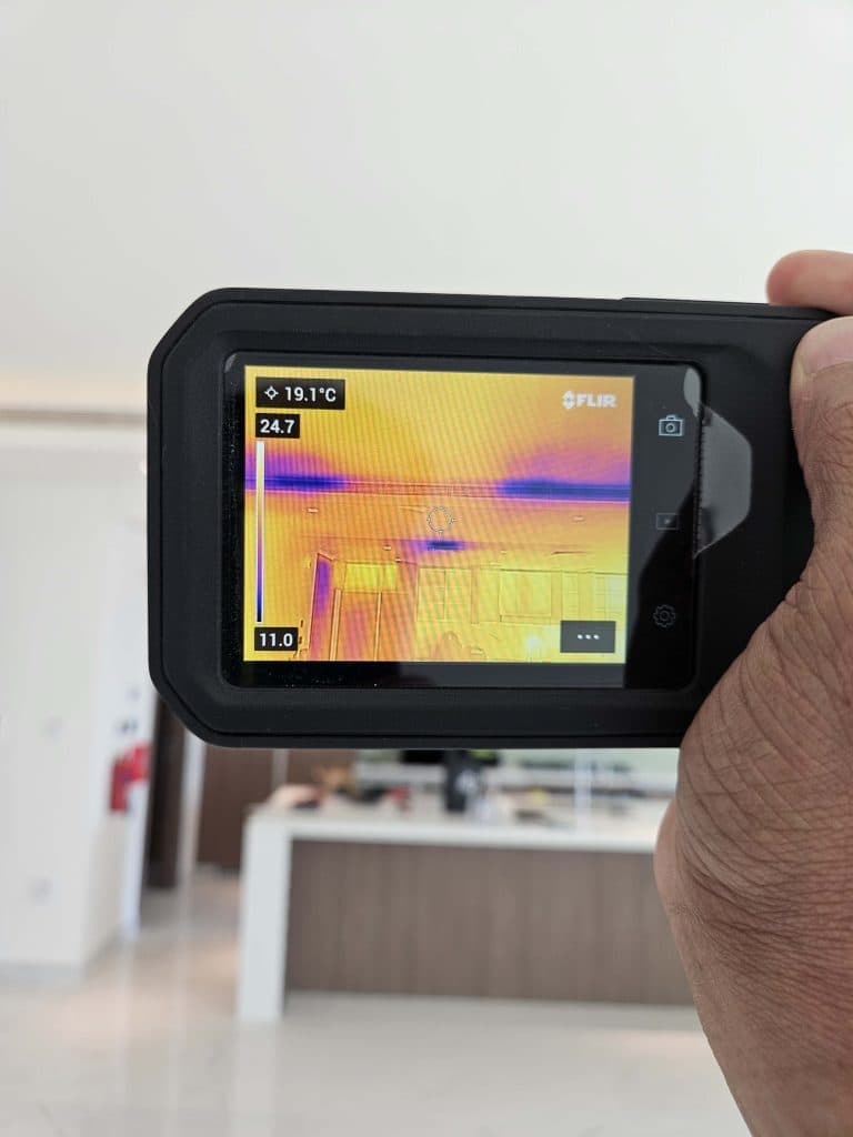 Thermal camera checking AC performance during a property inspection